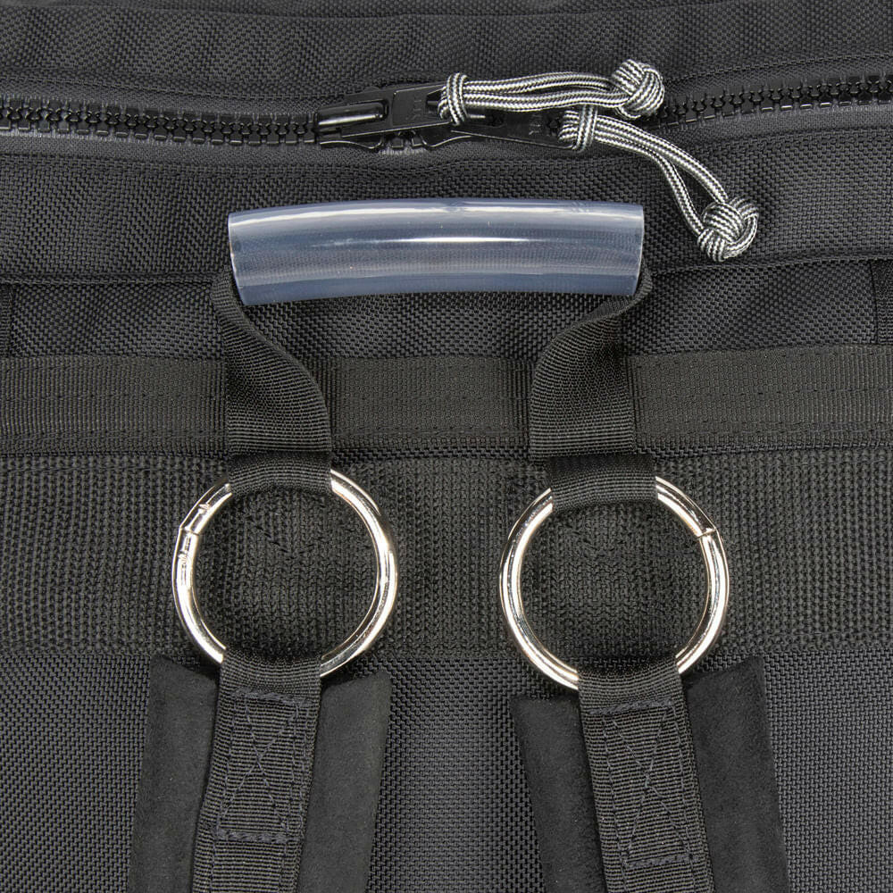 View of top grab handle and shoulder strap connection point. Railroad Rucksack Backpack.