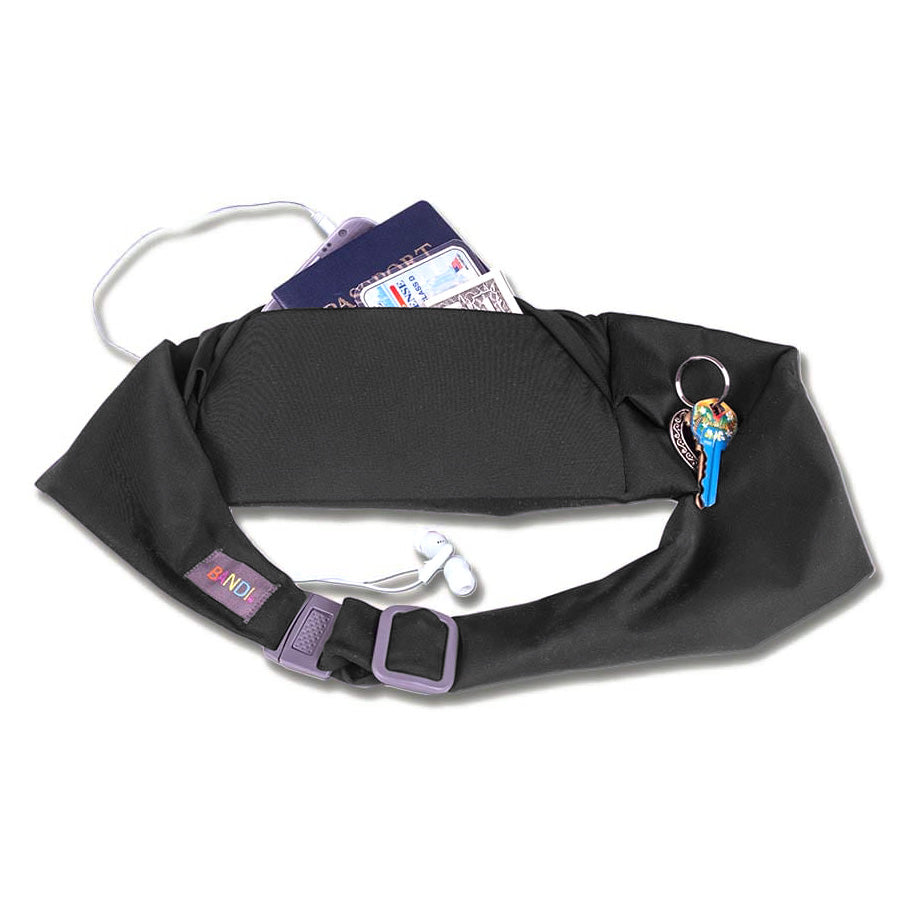 Easily accommodates cell phone, keys, passport and a wallet.
