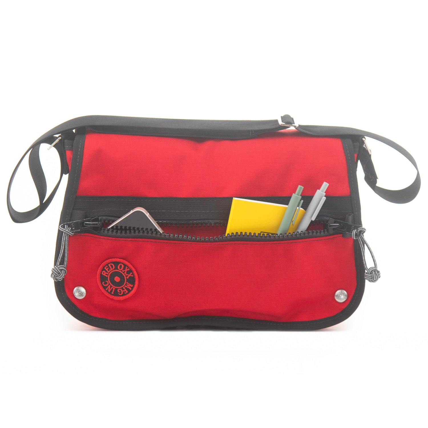 Front flap pocket with phone and notebook.