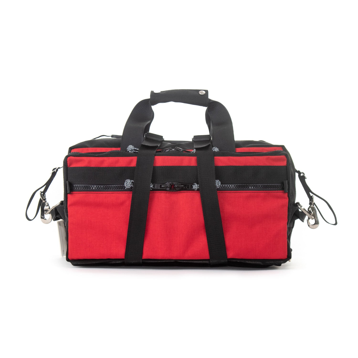 Small red convertible hybrid duffel bag . Made in USA. Back side view of Lil Hombre carry on duffle.