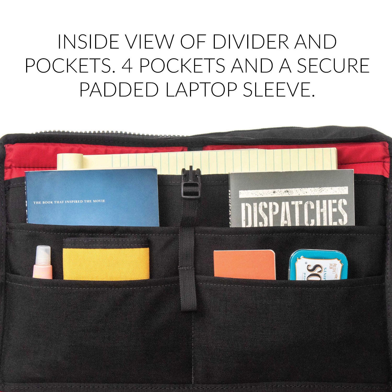 Inside view of divider and pockets. four pockets and a secure padded laptop sleeve.