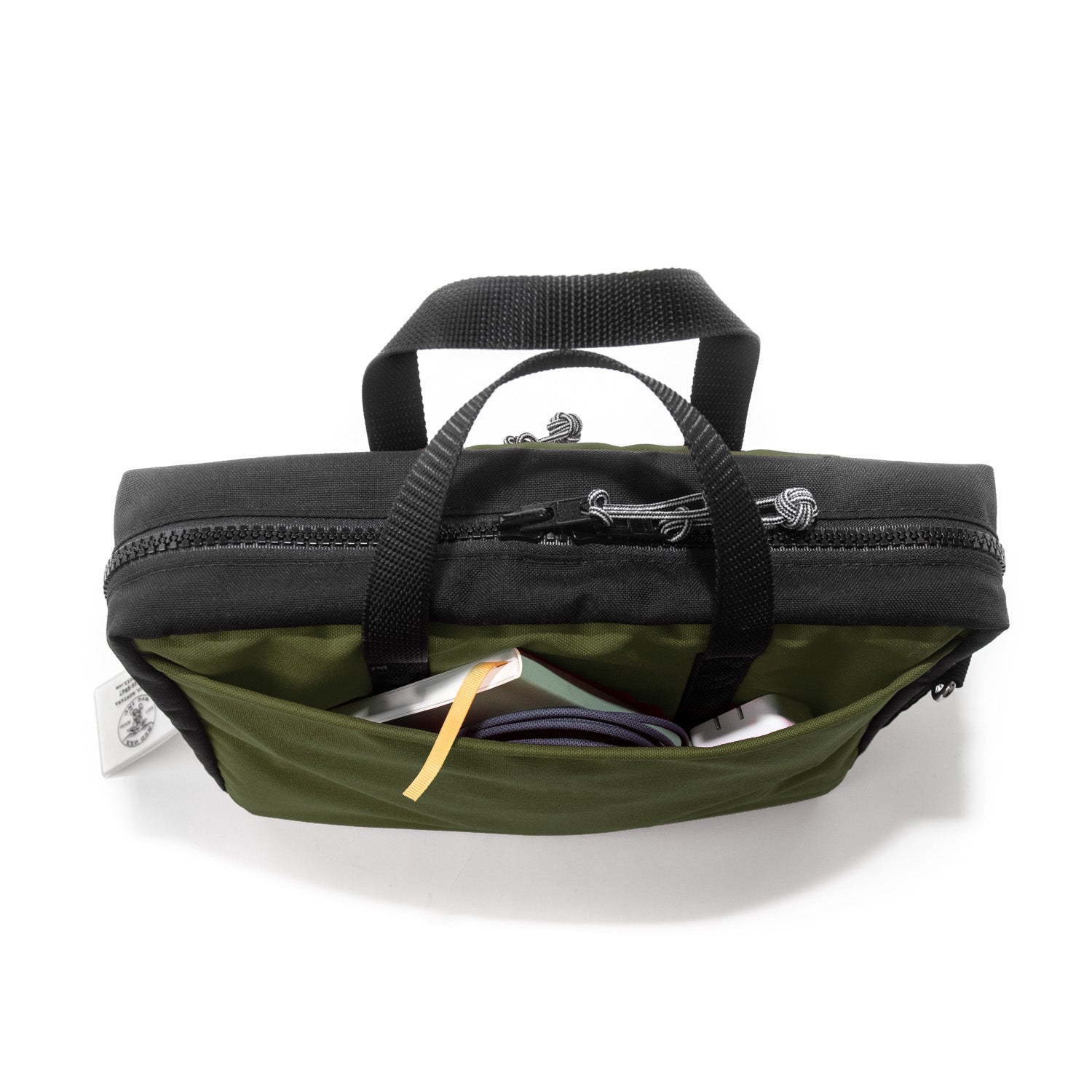 Small EDC bag, nylon tablet briefcase Top view of rear slip pocket with EDC items.