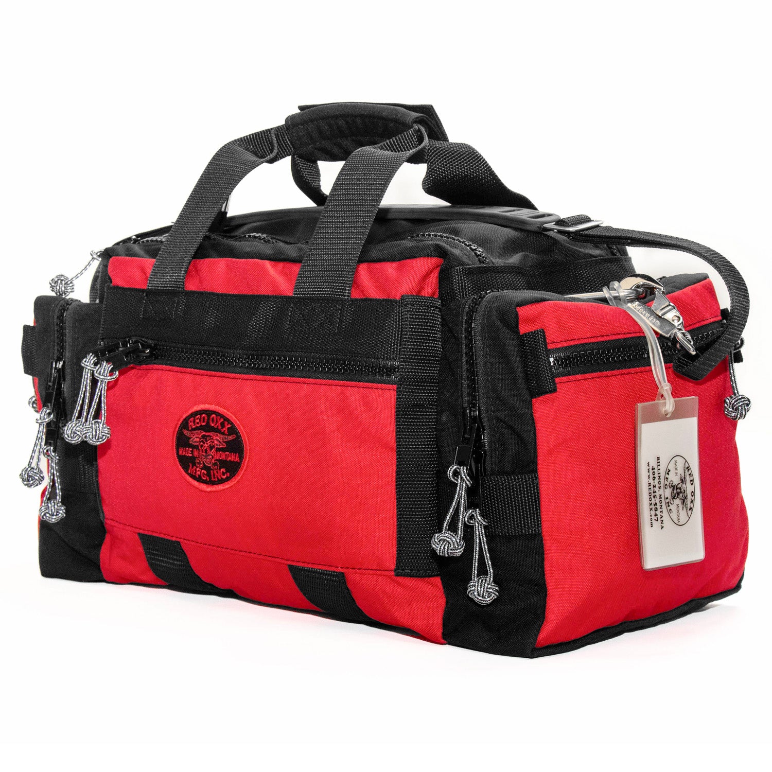 3/4 front view featuring luggage tag , handclasp and shoulder strap.