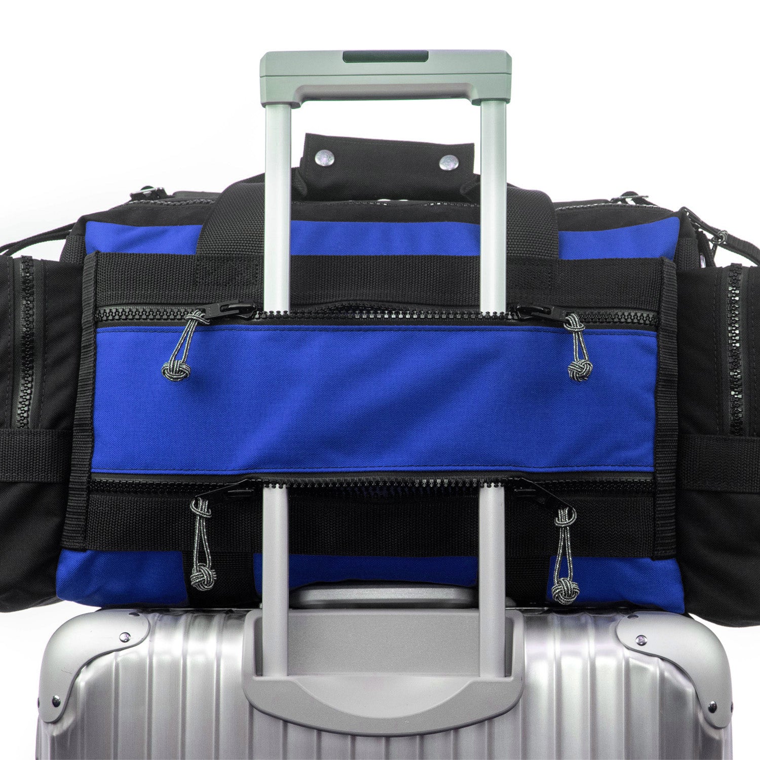 Pass thru pocket for easy mounting on wheeled luggage. 