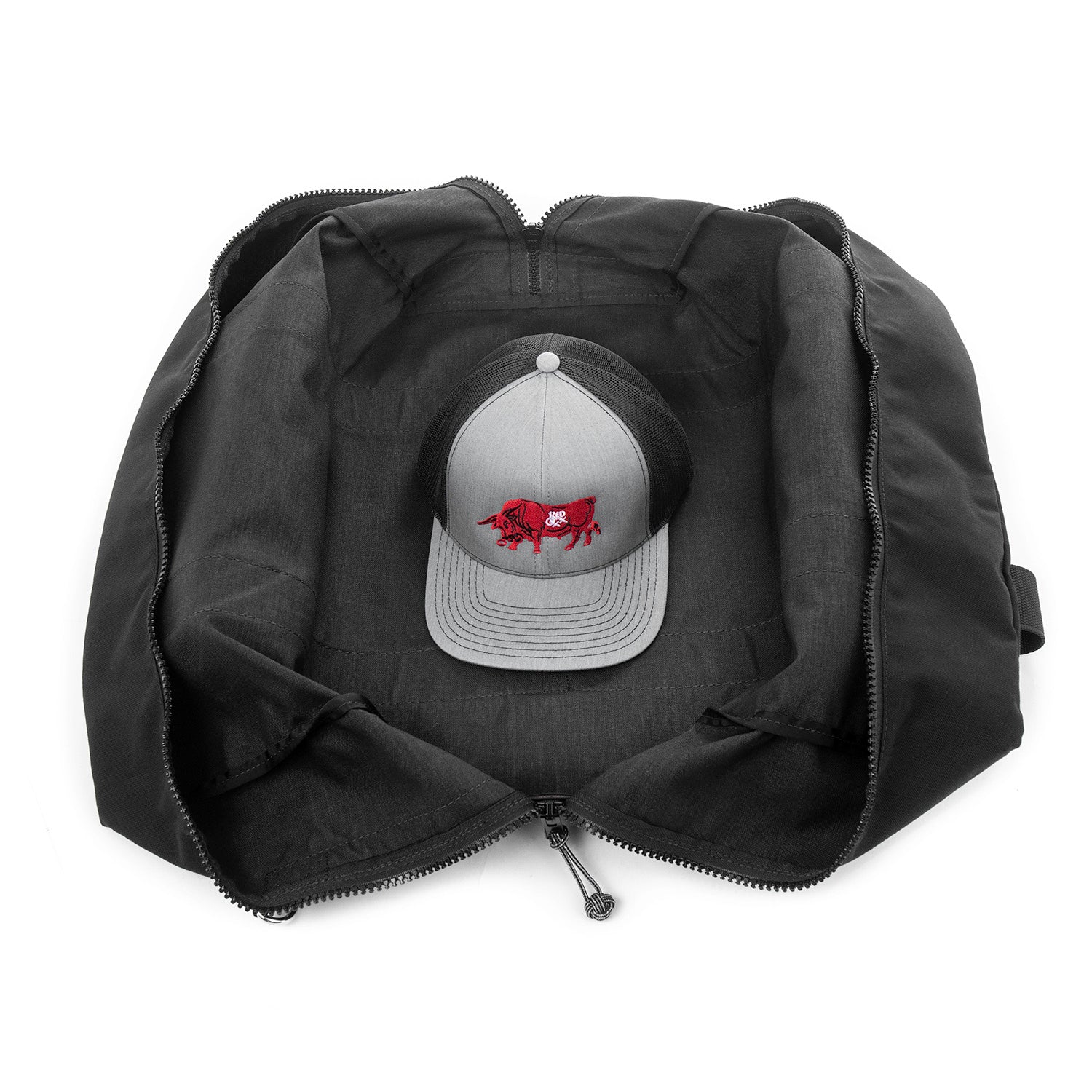 Fully open view of Small Aviator Kit Bag with Red Oxx Hat for scale.