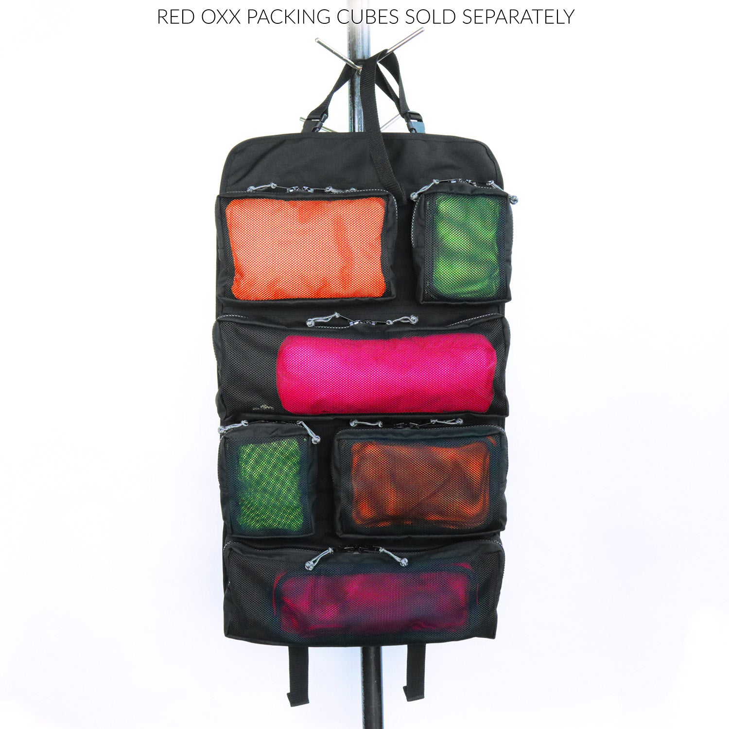 Tool roll up open featuring Red Oxx packing cubes sold separately.