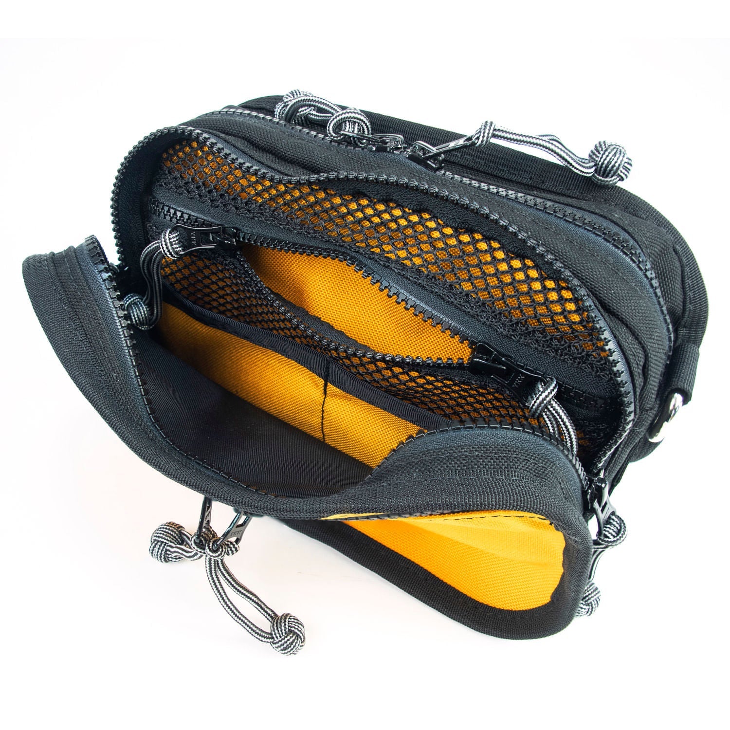 Open view of fanny pack shows internal pockets and divider.