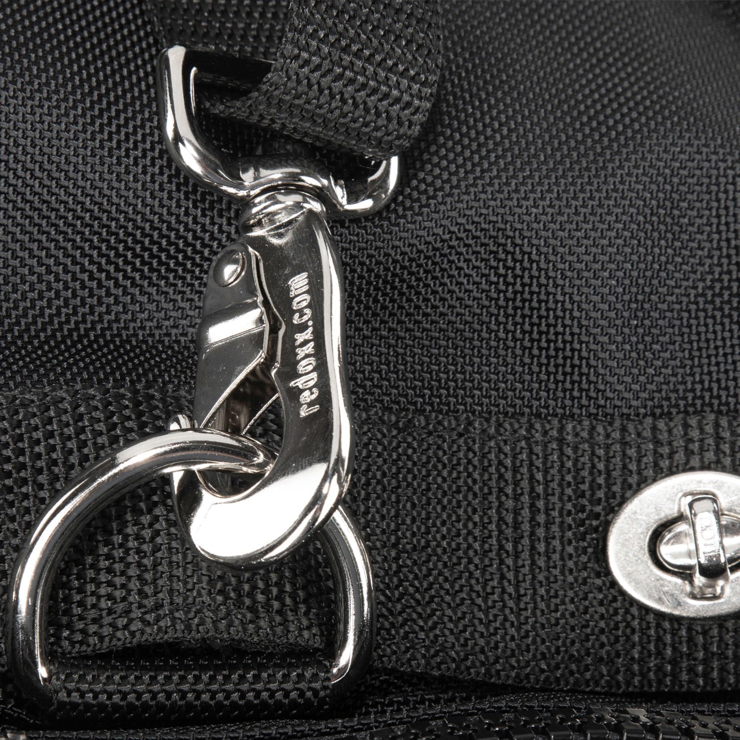 Railroad grip detail with D ring and 360 degree swivel clip shoulder strap hardware. 