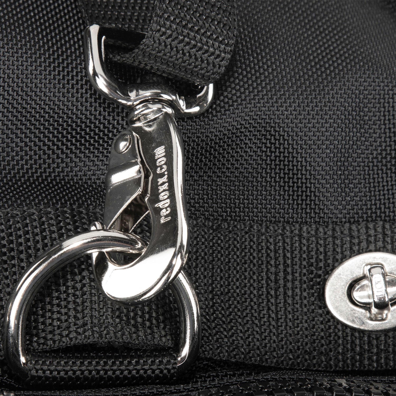 Railroad grip detail with D ring and 360 degree swivel clip shoulder strap hardware.