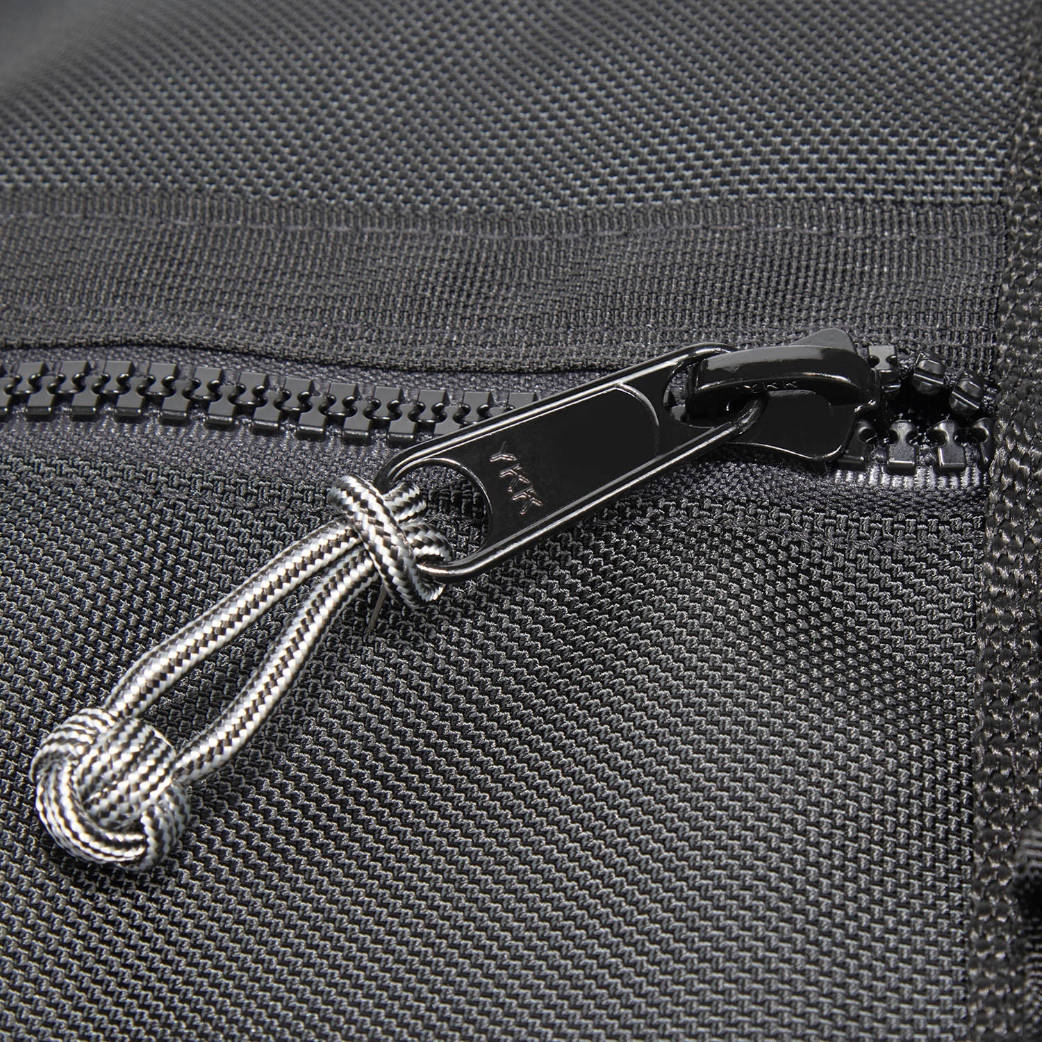 Zipper slider close up with Zip Knot.