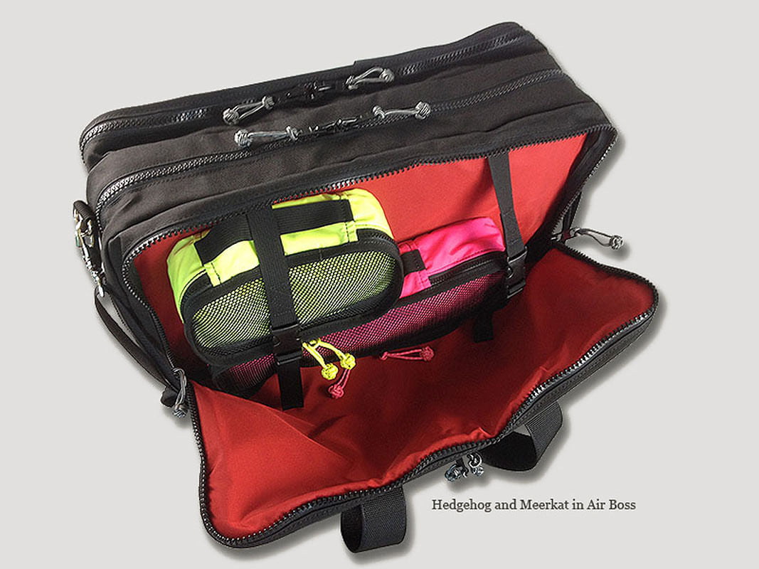 Meerkat and Hedgehog packing cubes in the Red Oxx Air Boss carry on bag. 