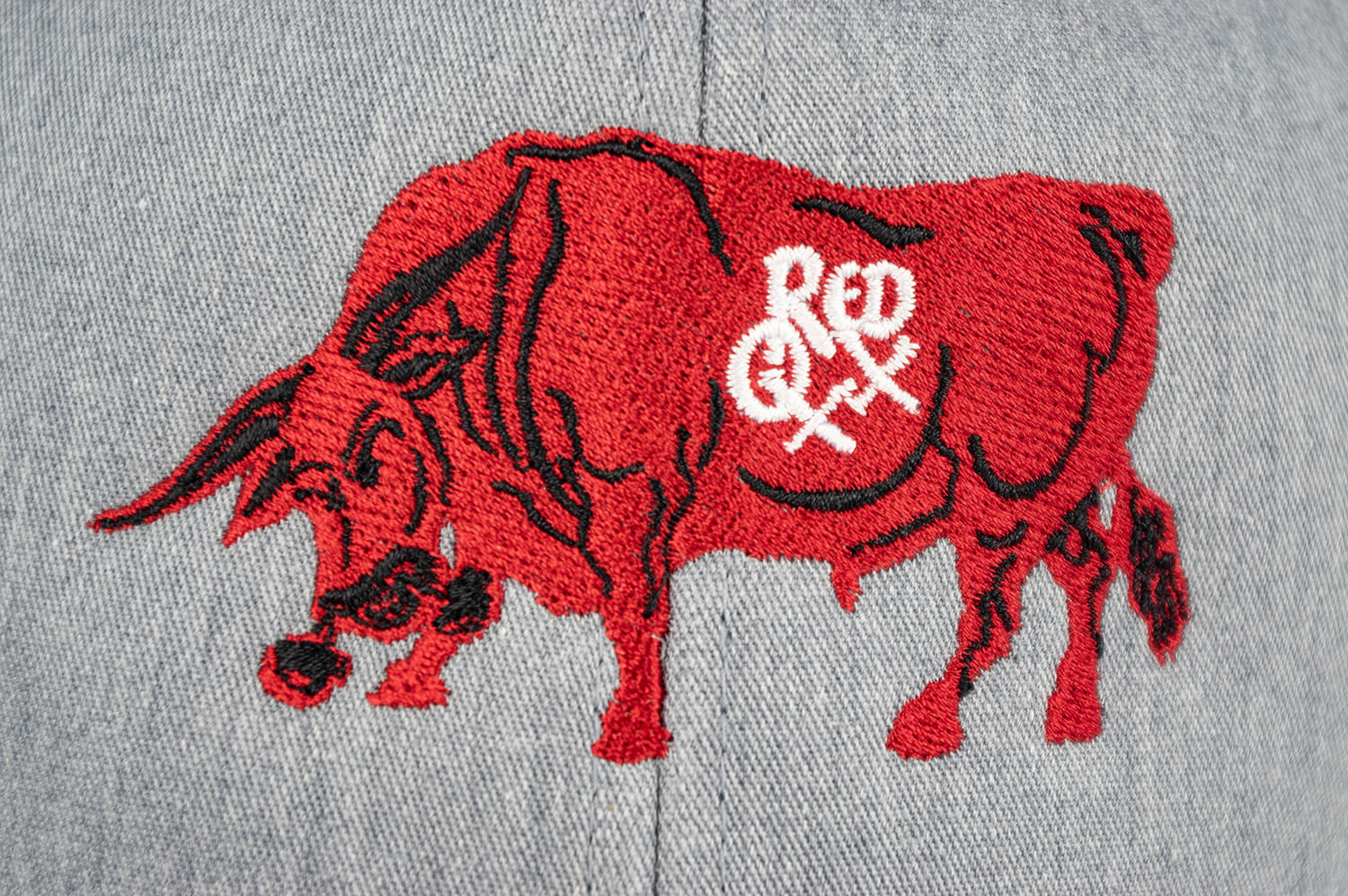Embroidery Closeup of Woodcut Logo Red Oxx 