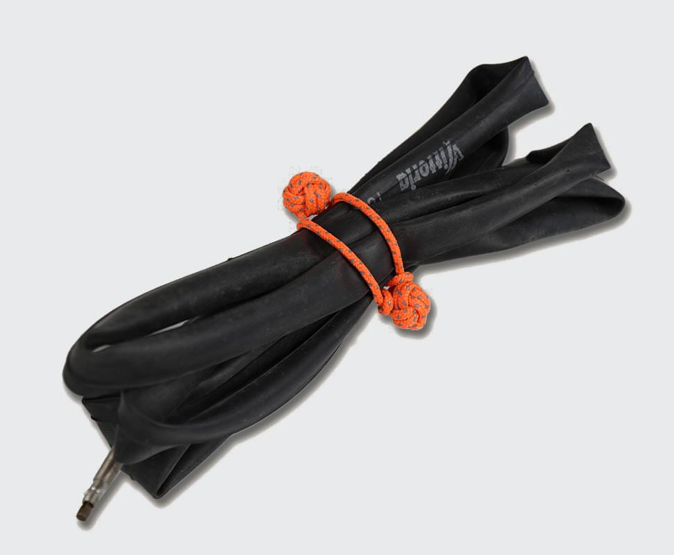 Two monkeys fist knots used to tie up an inner tube.