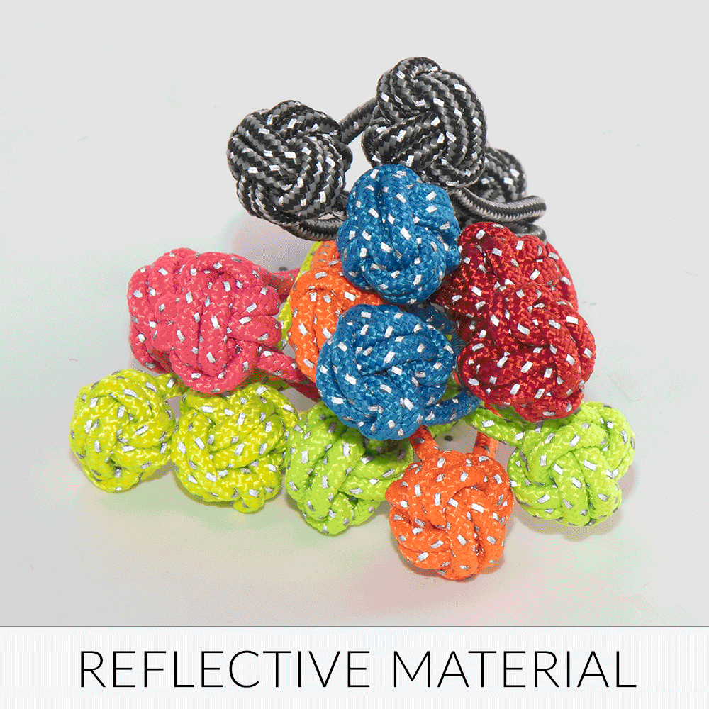 Reflective material demonstration with colored monkeys fist. 