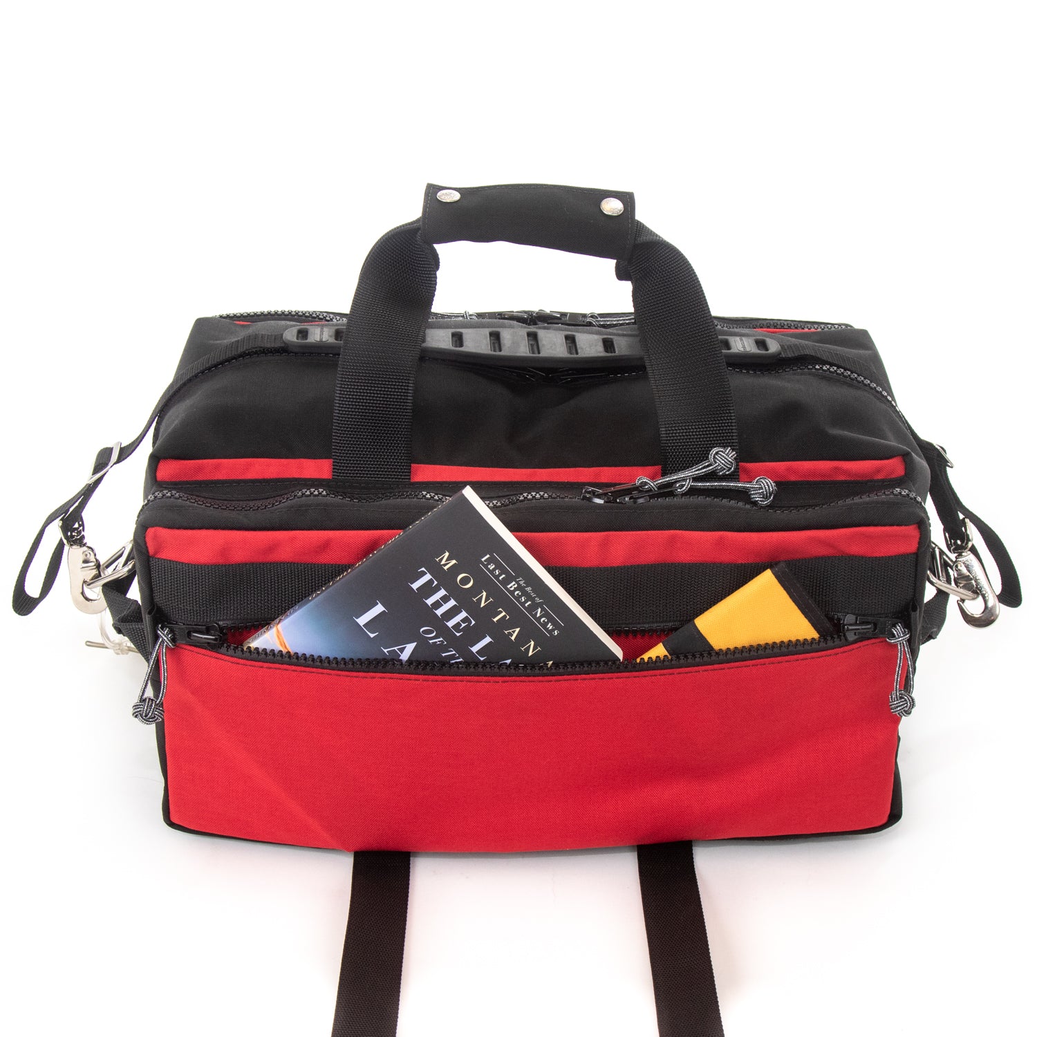 Lil Hombre carry on convertible duffle with book and Red Oxx Rigger Wallet. 