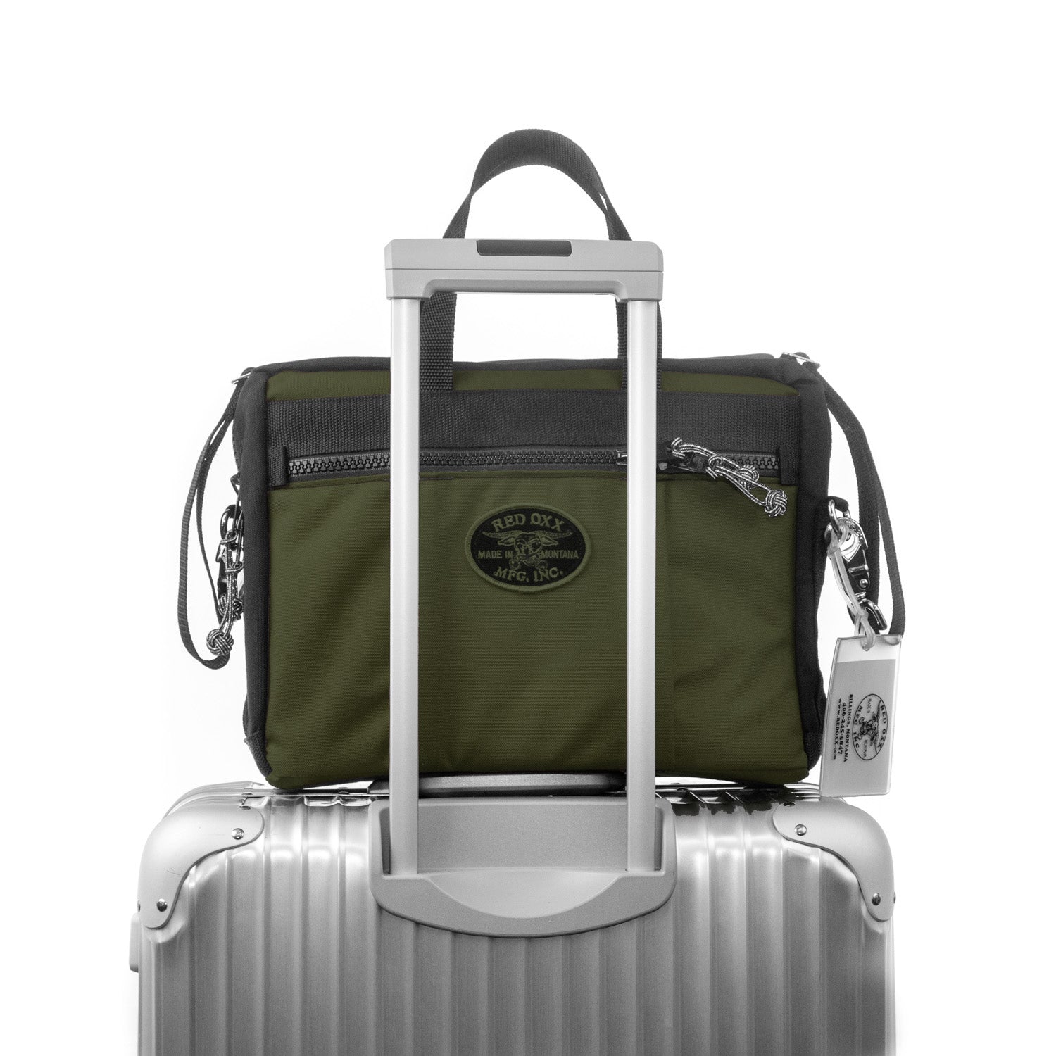 Buy it once nylon tablet briefcase. Micro manager sitting on top of wheeled luggage case. 