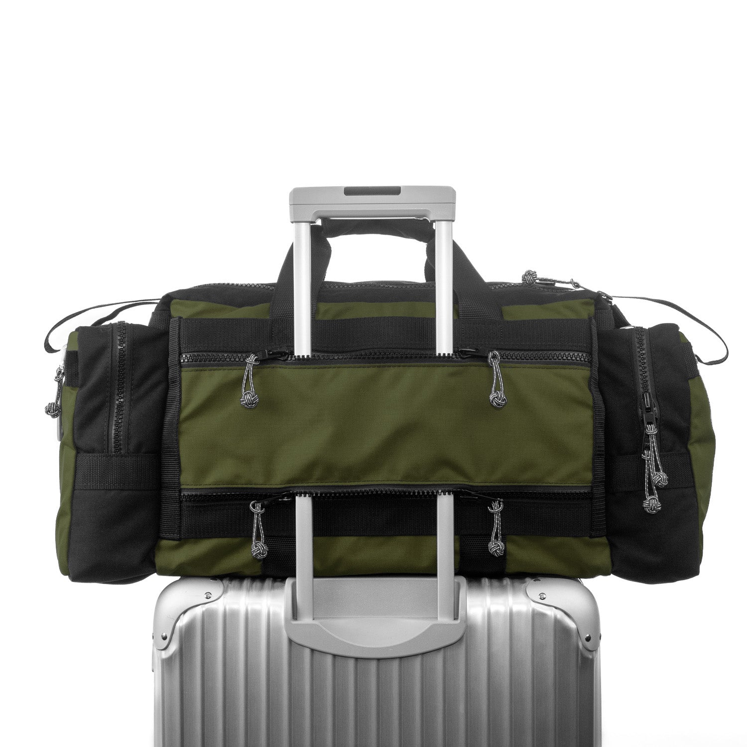 Pass thru pocket and bag on wheeled suitcase. 
