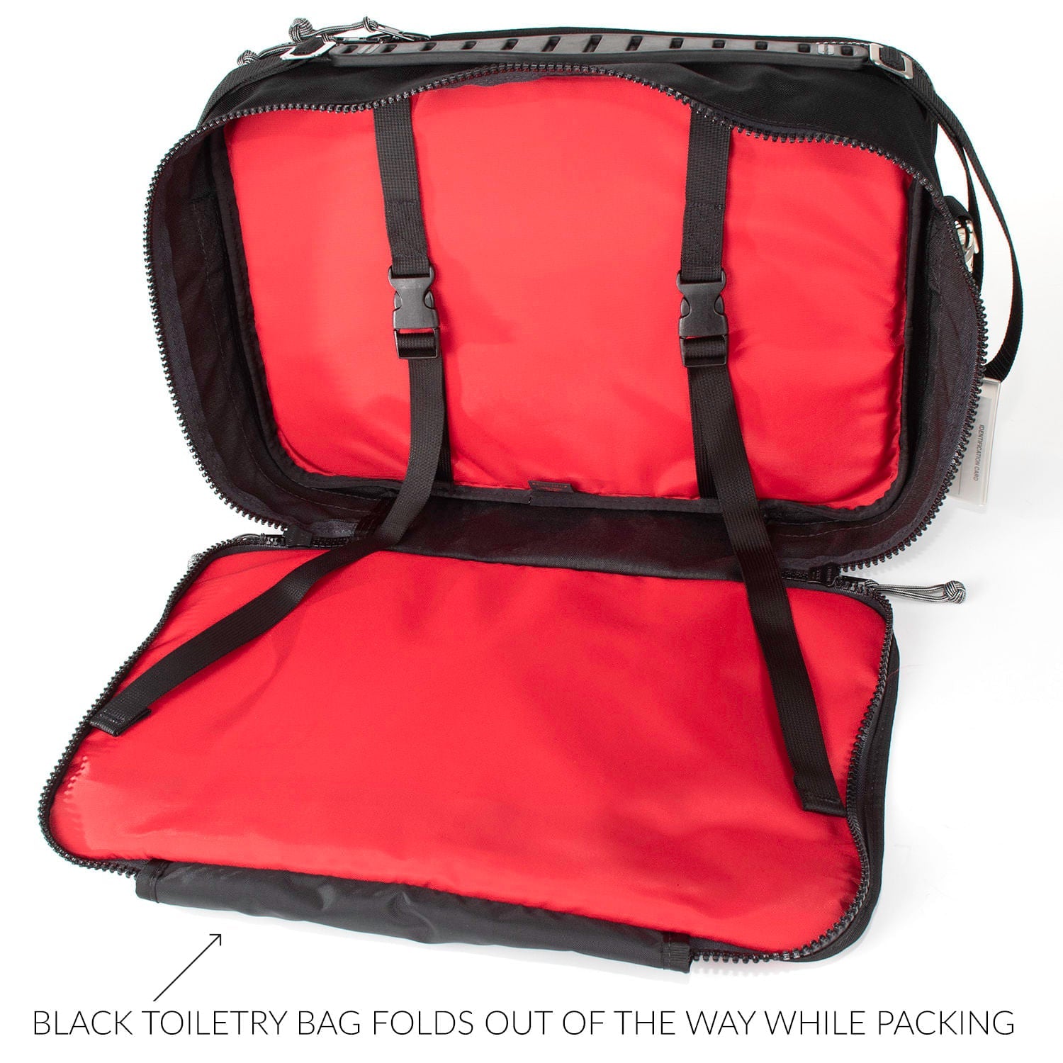 Black toiletry bag folds out of the way while packing. 