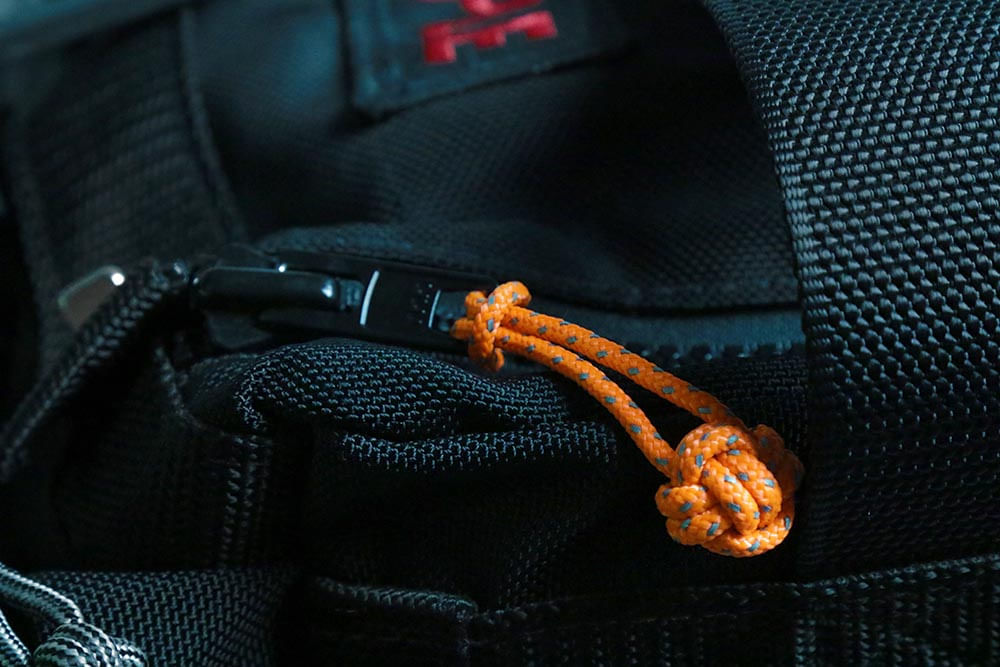 Closeup of the reflective monkeys fist knot 